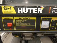 Лот: 20423255. Фото: 2. Бензиновый генератор Huter DY4000L... Инструмент и расходные