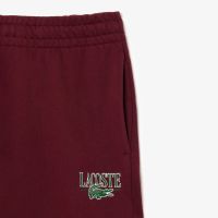 Лот: 22702396. Фото: 5. Женские спортивные брюки Lacoste