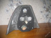 Лот: 2695130. Фото: 2. Фонарь corolla 121. Автозапчасти