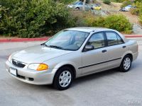 Лот: 13607633. Фото: 10. Mazda Familia, 323 1998-2003 седан...