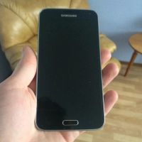 Лот: 6860400. Фото: 4. Galaxy S5 Duos 16 ГБ черный