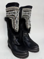 Лот: 25942972. Фото: 2. Унты женские натуральные новые. Женская обувь