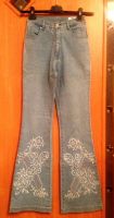 Лот: 10367877. Фото: 2. Джинсы со стразами. Женская одежда