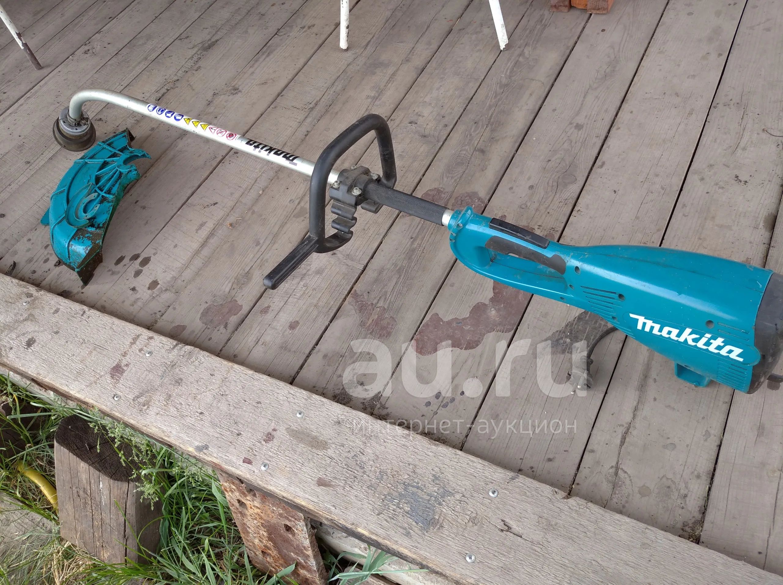 Триммер электрический Makita ur3000