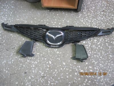 Лот: 4376500. Фото: 1. решетка радиатора Mazda Demio... Кузов