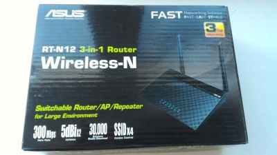 Лот: 9406494. Фото: 1. ASUS RT-N12 Беспроводной маршрутизатор... Маршрутизаторы (роутеры)