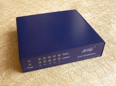 Лот: 579555. Фото: 1. Adaptor Switch – ACORP. Проводные модемы
