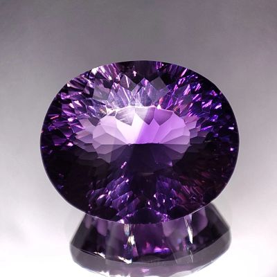 Лот: 21522285. Фото: 1. 27.30 ct. Аметист овал. Боливия... Драгоценные и поделочные камни