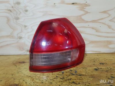 Лот: 18537150. Фото: 1. Фонарь Nissan Wingroad WFY11 QG15DE... Оптика и освещение