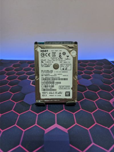 Лот: 25038431. Фото: 1. Жесткий диск 1Tb/2.5"/5400/HGST... Жёсткие диски (HDD)