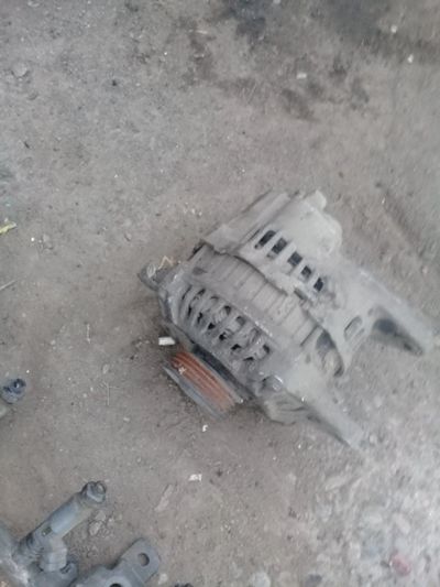 Лот: 11678606. Фото: 1. генератор mazda familia мазда... Электрооборудование