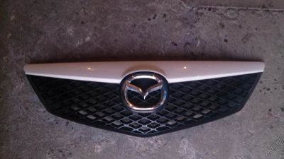 Лот: 5257068. Фото: 1. Решетка радиатора Mazda Demio... Кузов