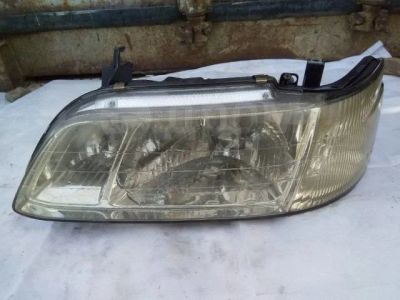 Лот: 17396634. Фото: 1. Фара Nissan Laurel, левая HC35. Оптика и освещение