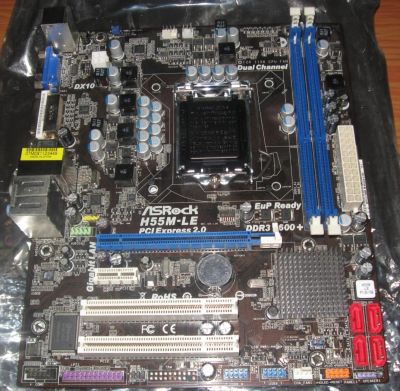 Лот: 6896886. Фото: 1. загнуты ножки asrock h55m-le 1156. Материнские платы