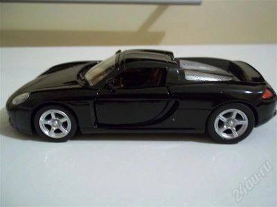 Лот: 704596. Фото: 1. моделька Porcshe Carrera. Автомоделизм