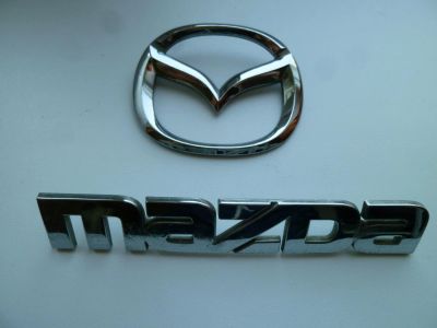 Лот: 4228298. Фото: 1. Mazda Familia, 2003 г - эмблема... Кузов
