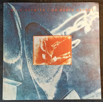Лот: 20225539. Фото: 1. LP Dire Straits - On Every Street. Аудиозаписи