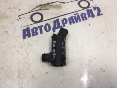 Лот: 21716324. Фото: 1. насос омывателя Kia Rio DC. Двигатель и элементы двигателя