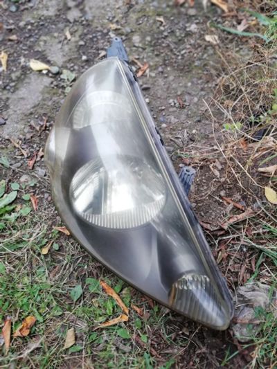 Лот: 16607210. Фото: 1. Фара Honda Fit правая (1 модель... Оптика и освещение