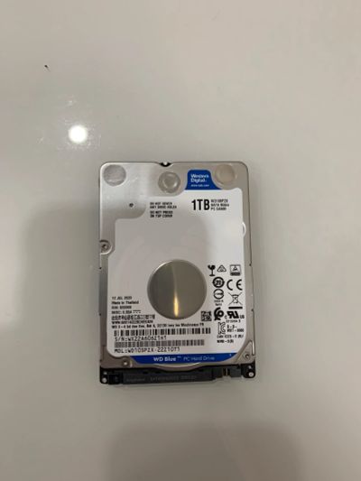 Лот: 18203478. Фото: 1. 1 тб Жесткий диск WD Blue (WD10spzx... Жёсткие диски (HDD)