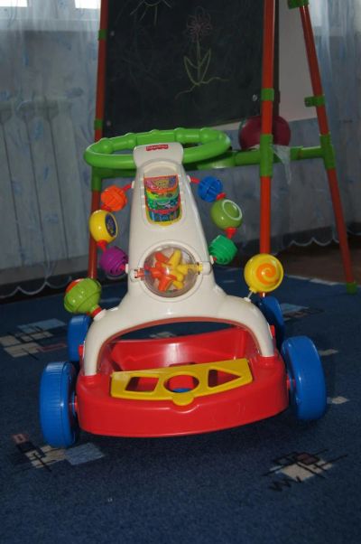 Лот: 6871444. Фото: 1. Ходилка-толокар Fisher Price. Ходунки, прыгунки, качели