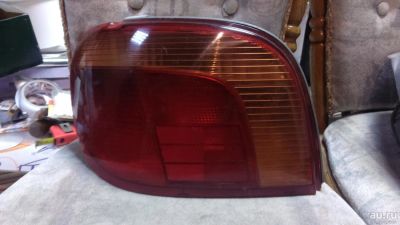 Лот: 10000009. Фото: 1. Задний фонарь (левый) Toyota Vitz... Оптика и освещение
