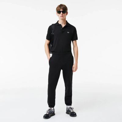 Лот: 22702512. Фото: 1. Мужские спортивные брюки Lacoste. Другое (спортивная одежда)