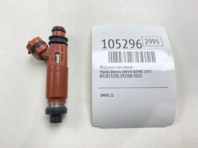 Лот: 25003390. Фото: 1. Форсунка топливная Mazda Demio... Топливная система
