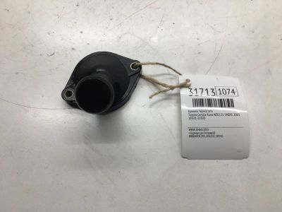 Лот: 20385834. Фото: 1. Крышка термостата Toyota Corolla... Кузов