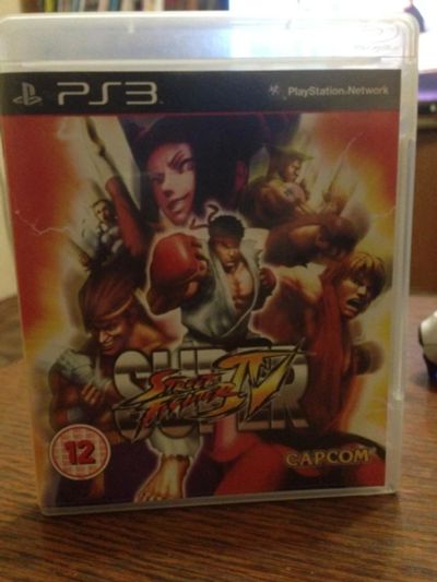 Лот: 10715569. Фото: 1. super street fighter 4 playstation... Игры для консолей