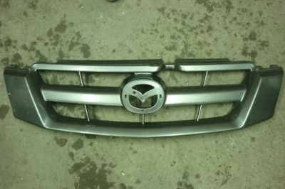 Лот: 9102790. Фото: 1. Решетка радиатора Mazda Tribute... Кузов