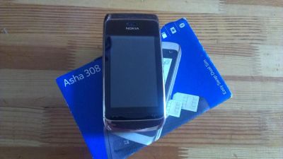 Лот: 6178917. Фото: 1. Nokia Asha 308 GOLD \ 2 SiM. Кнопочные мобильные телефоны