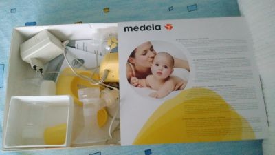 Лот: 12766210. Фото: 1. Молокоотсос мини Medela элетрический. Всё для кормления