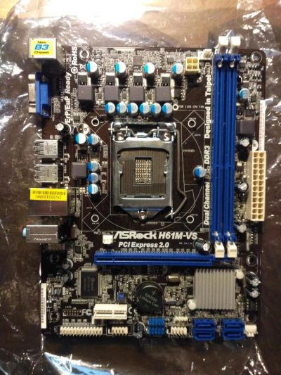 Лот: 10509470. Фото: 1. ASRock H61M-VS. Материнские платы