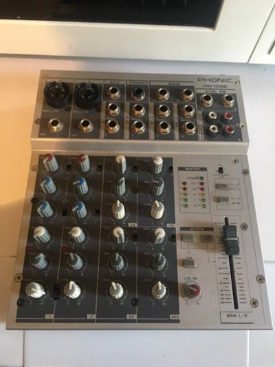 Лот: 11304245. Фото: 1. Микшерный пульт Phonic MM 1002. Микшеры, предусилители, микрофонные эффекты