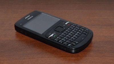 Лот: 7731664. Фото: 1. телефон nokia c3 00 черный + зарядка. Кнопочные мобильные телефоны