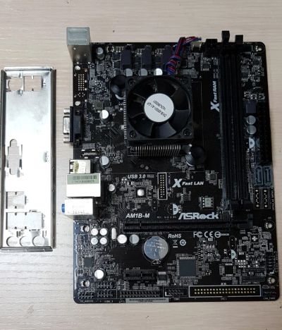 Лот: 14320318. Фото: 1. Материнская плата ASRock AM1B-M... Материнские платы