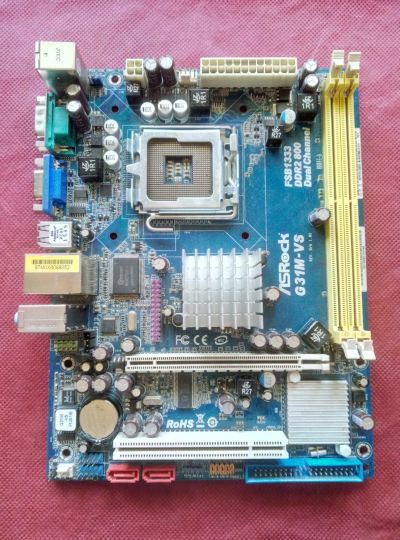 Лот: 15848576. Фото: 1. Материнская плата ASRock G31M-VS... Материнские платы