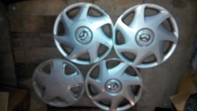 Лот: 5168688. Фото: 1. Колпаки: 3 Mazda + 1 Toyota. Колпаки