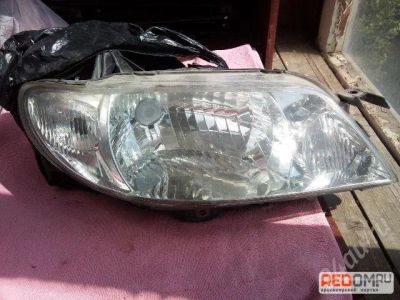Лот: 562104. Фото: 1. Фара правая Mazda Familia рестайл... Оптика и освещение