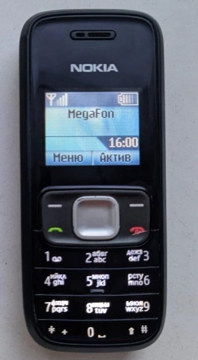 Лот: 18412528. Фото: 1. Nokia 1209 с фонариком. Кнопочные мобильные телефоны