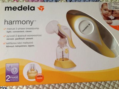 Лот: 3884653. Фото: 1. Молокоотсос Medela. Другое (кормление и уход, гигиена)