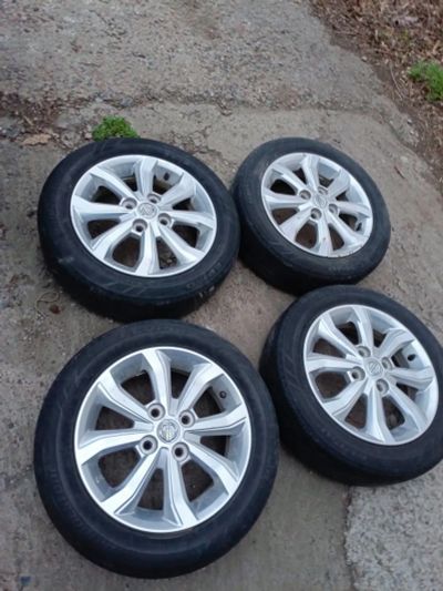 Лот: 25645739. Фото: 1. Литые диски r14 4:100 nissan. Диски