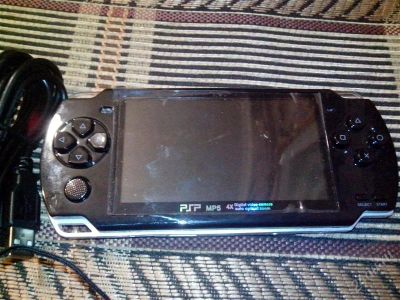 Лот: 2258779. Фото: 1. PSP. Игровые приставки, консоли