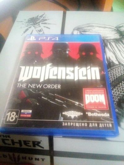 Лот: 10868787. Фото: 1. wolfenstein the new order (ps4... Игры для консолей