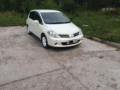 Лот: 10009259. Фото: 1. Nissan Tiida, 2010 год. Автомобили