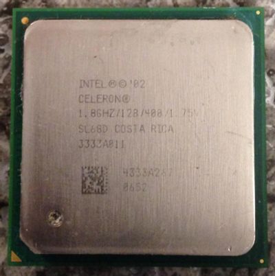 Лот: 7084517. Фото: 1. Процессор Intel Celeron 1.8/128... Процессоры