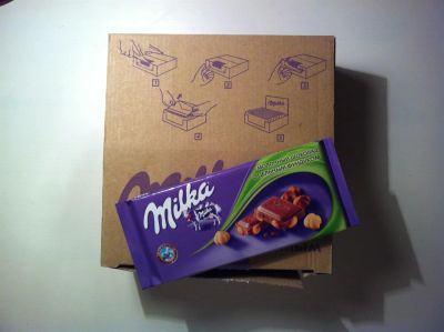 Лот: 3330831. Фото: 1. Шоколадки Milka с цельным фундуком... Шоколад, конфеты
