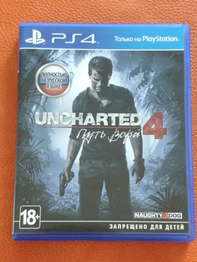 Лот: 16176605. Фото: 1. Игра PS4 Uncharted 4. Игры для консолей