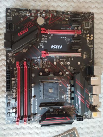 Лот: 18588805. Фото: 1. MSI b450 Gaming Plus. Материнские платы